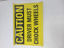 Picture of DECAL CAUTION CHOCK WHEELS